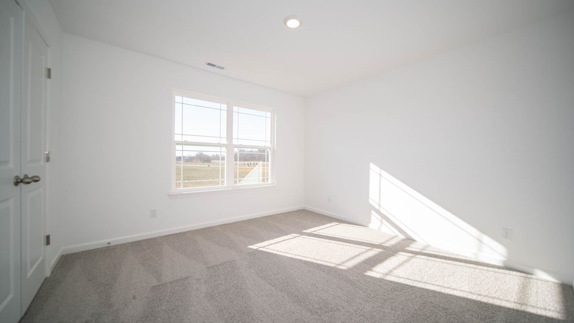 bedroom 4 with large windows