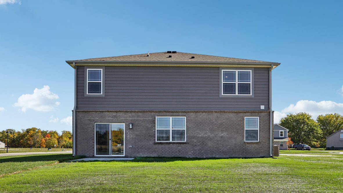 rear view of home and backyard