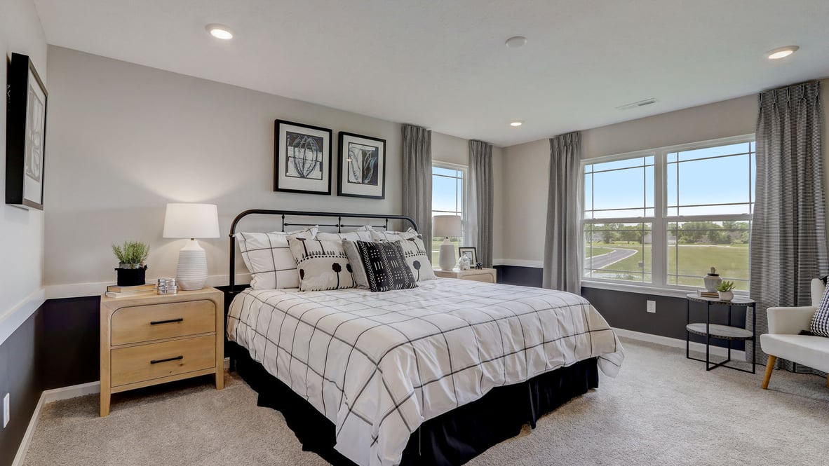 primary bedroom with large windows