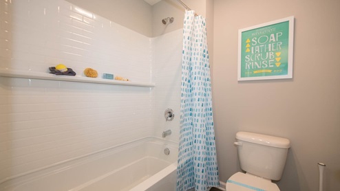 bathroom with shower and tub combo