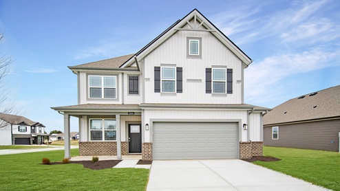 two story home with gray trim and front porch in Danville