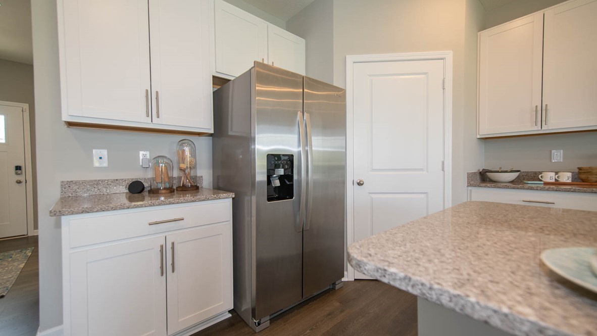 kitchen with large corner pantry