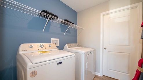 laundry room with wire shelving
