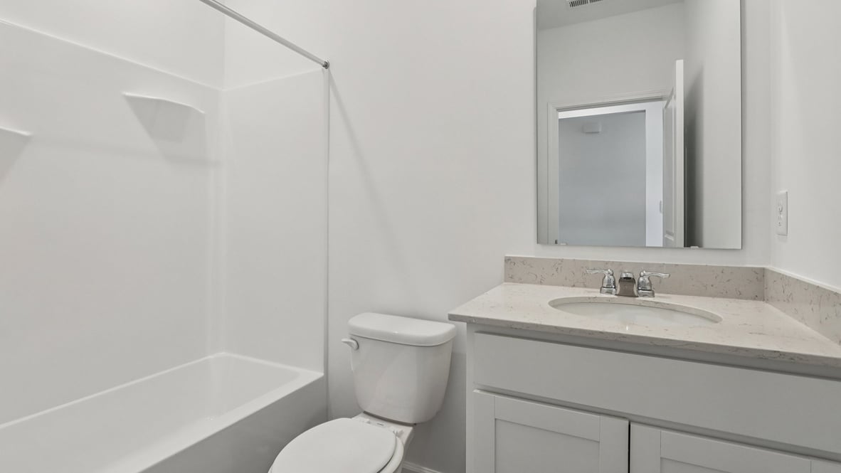 bathroom with shower and tub combo
