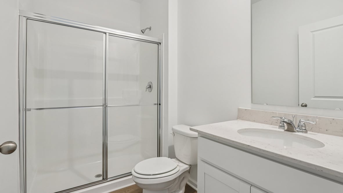 bathroom with walk-in shower