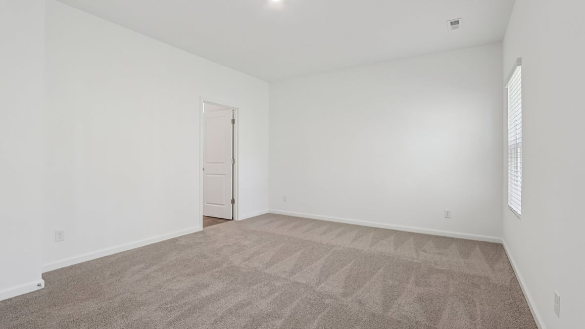 primary bedroom with large windows