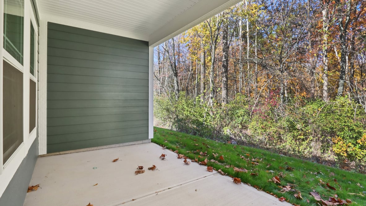 covered patio on the back of the home