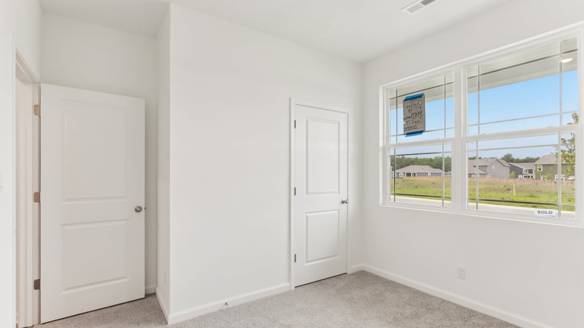 bedroom with large windows