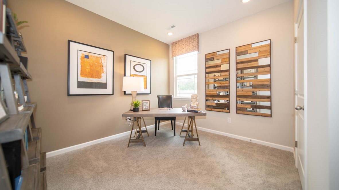 Fourth bedroom with a window and carpet flooring