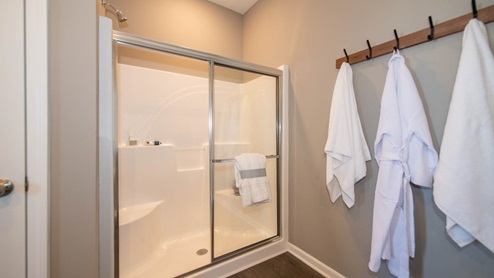 The primary bathroom includes a shower and private water closet