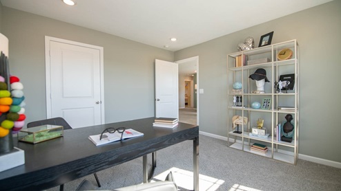 Located in the rear of the home is the third bedroom and often used as a home office