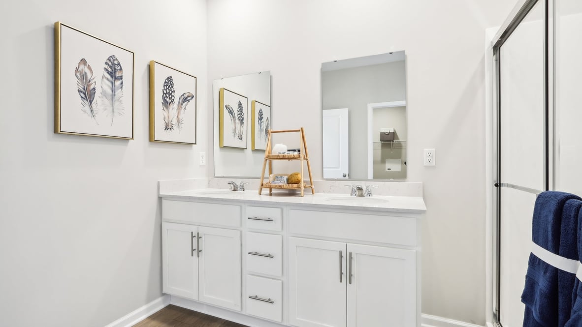 primary bathroom with white vanity