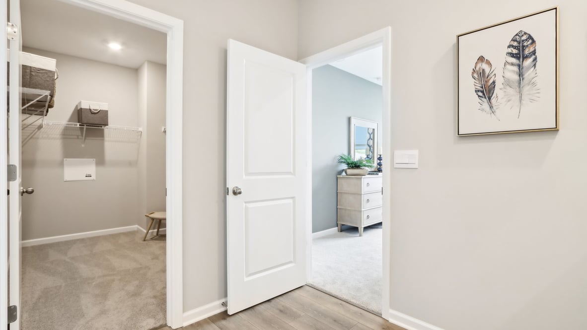 bathroom looking into closet