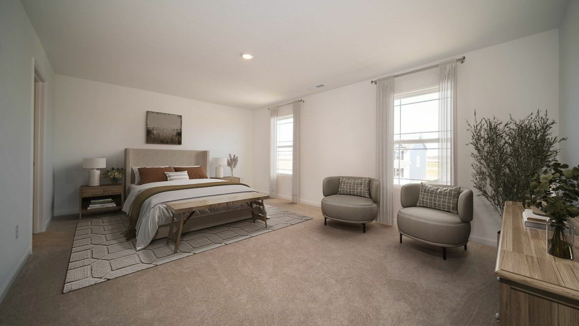 primary bedroom with large windows