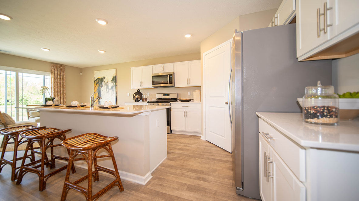 kitchen with large corner pantry