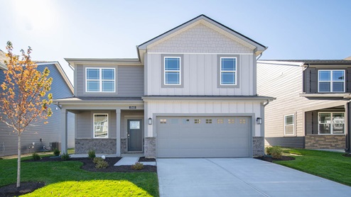 Two story home with gray trim