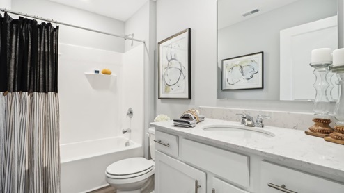 bathroom with shower and tub combo