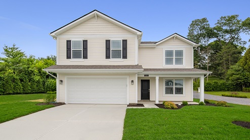 two story home with neutral siding and front porch