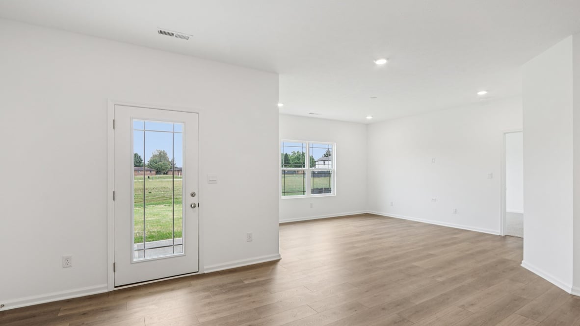View from the front door looking into the home with nearby full bathroom access Parkview Village