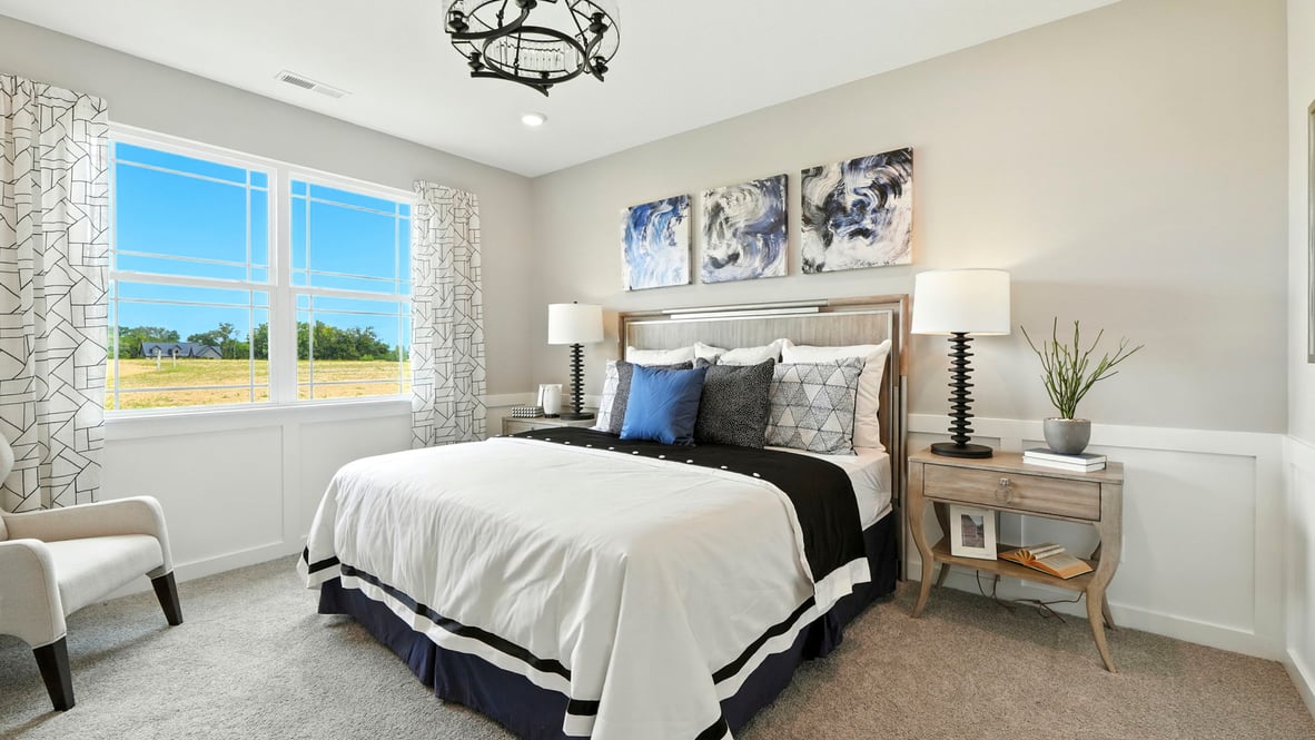 primary bedroom with large windows