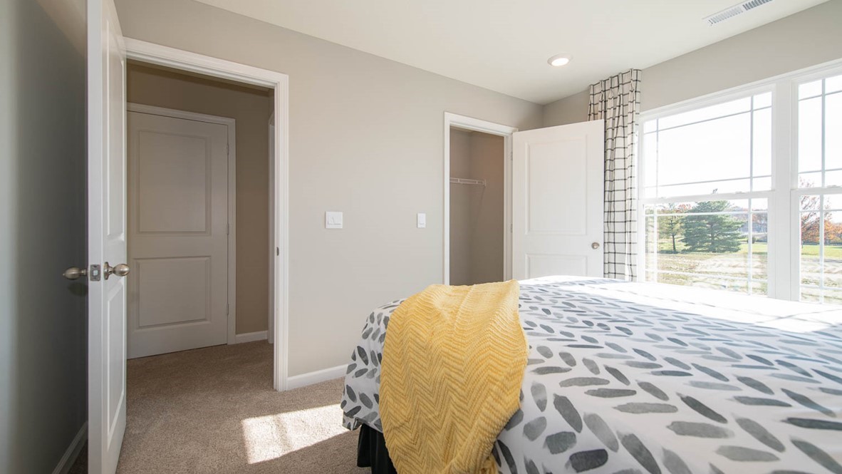 bedroom 2 with large windows