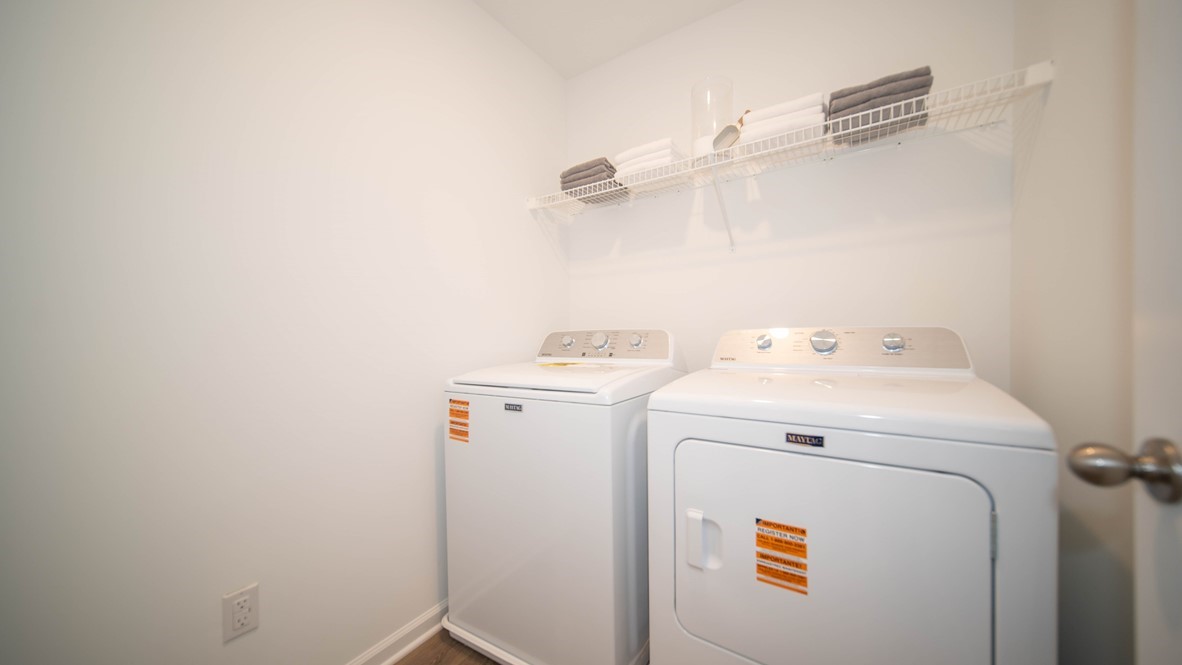 laundry room with shelving
