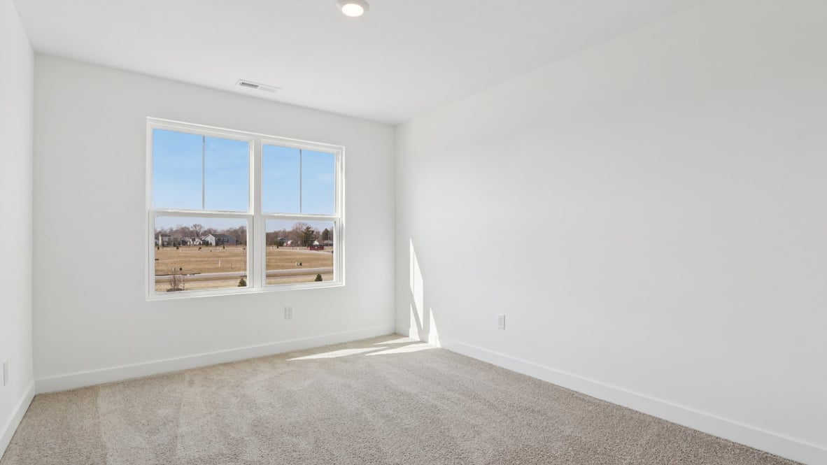 bedroom with large windows