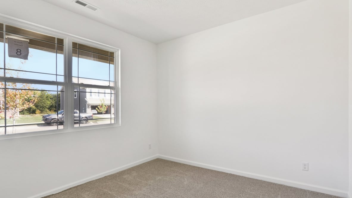 bedroom with large windows