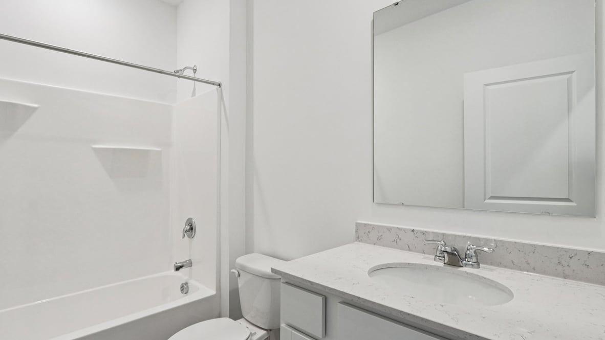 bathroom with shower and tub combo