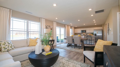 open concept floor plan living area and dining