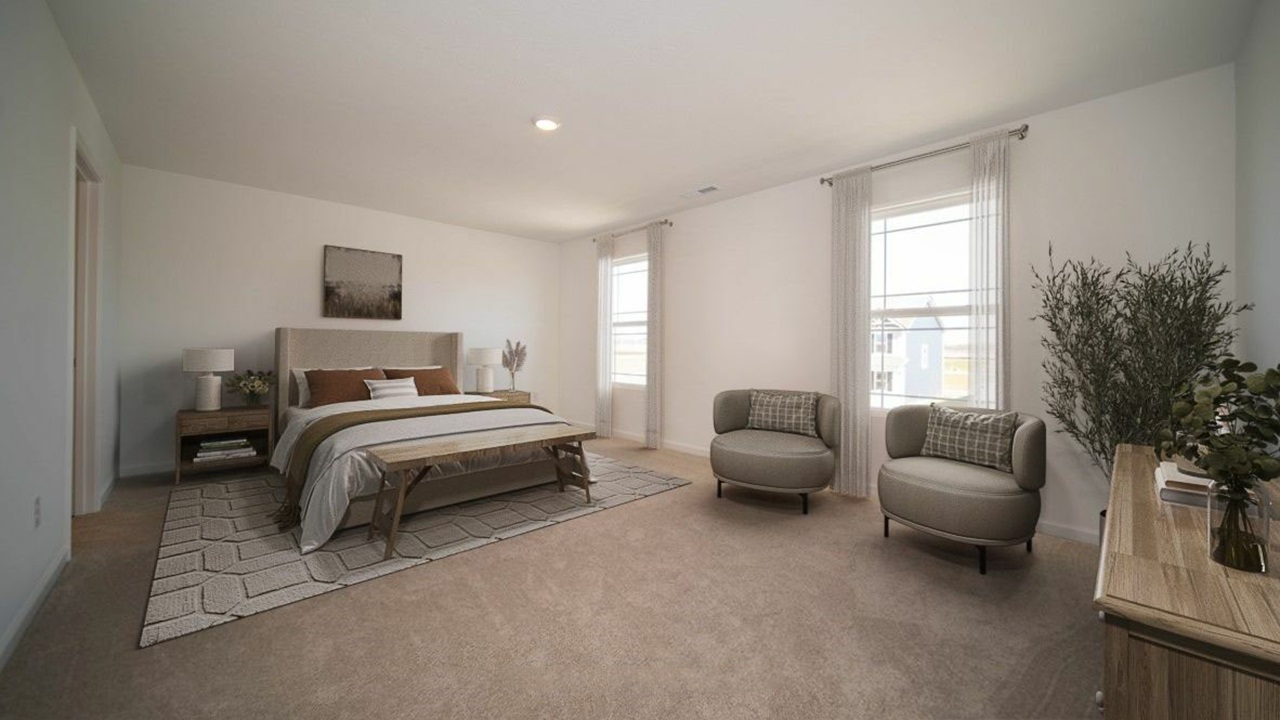 primary bedroom with large windows