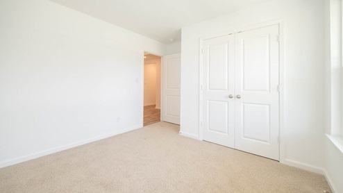 A Second bedroom contains generous closet space