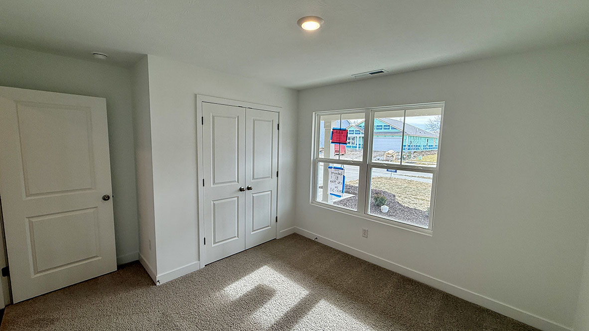 bedroom with large windows