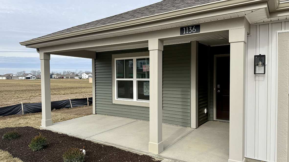 covered porch on the front of the home