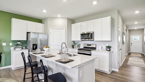 kitchen with white cabinets