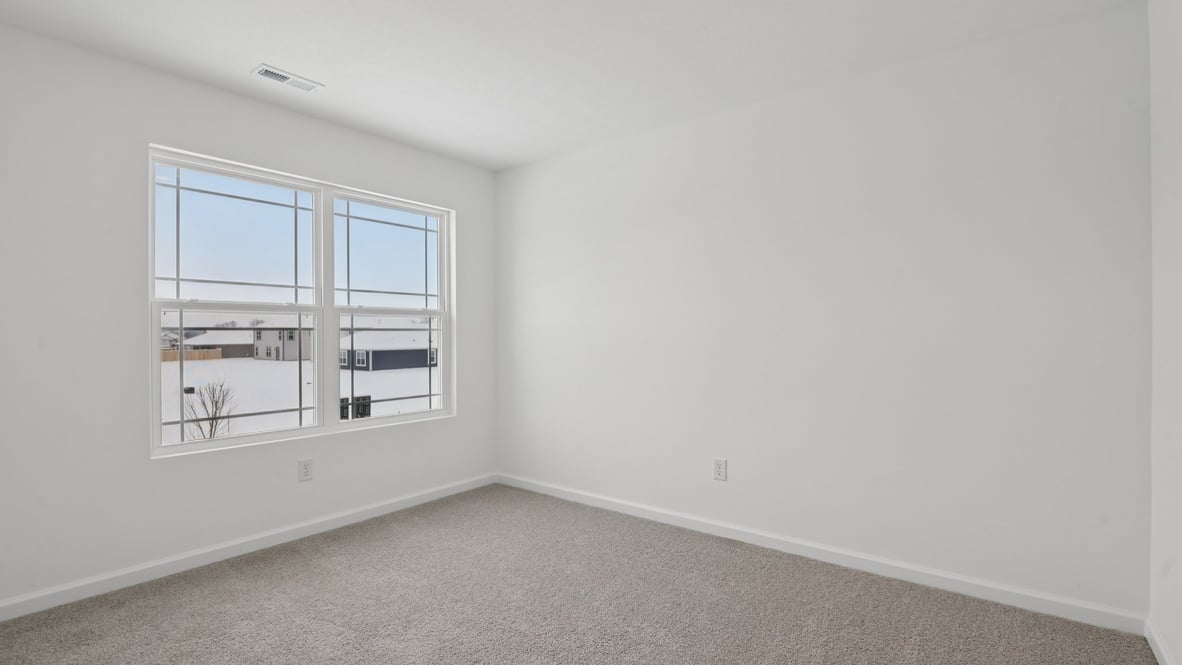 bedroom with dual windows