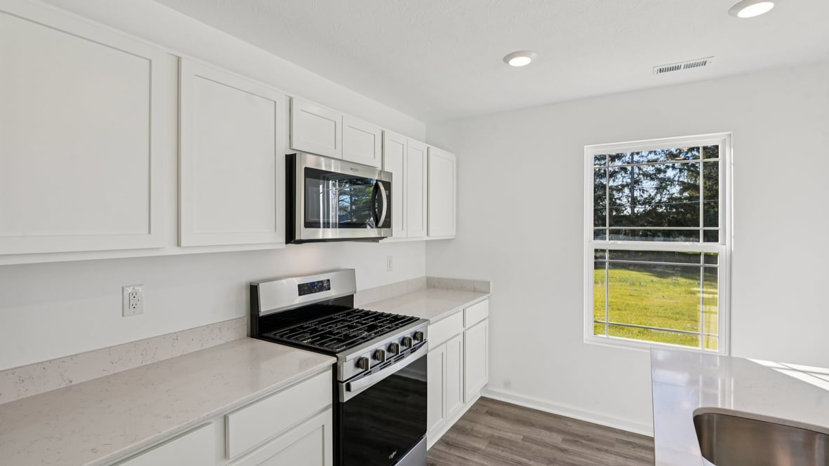 kitchen with white cabinets