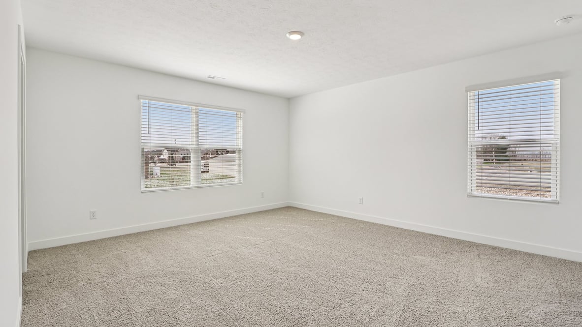 primary bedroom with large windows