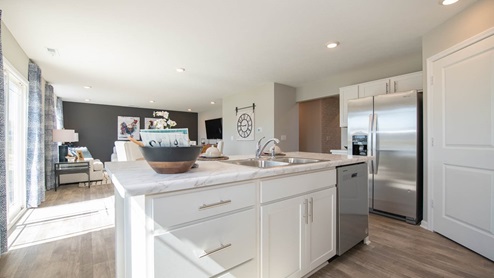 kitchen with large corner pantry