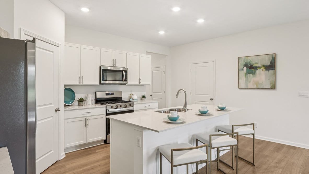 kitchen island offers seating for three