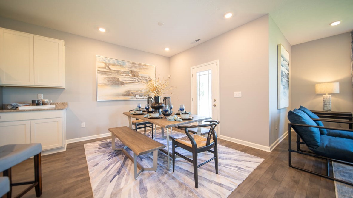 dining nook that opens into the great room and kitchen