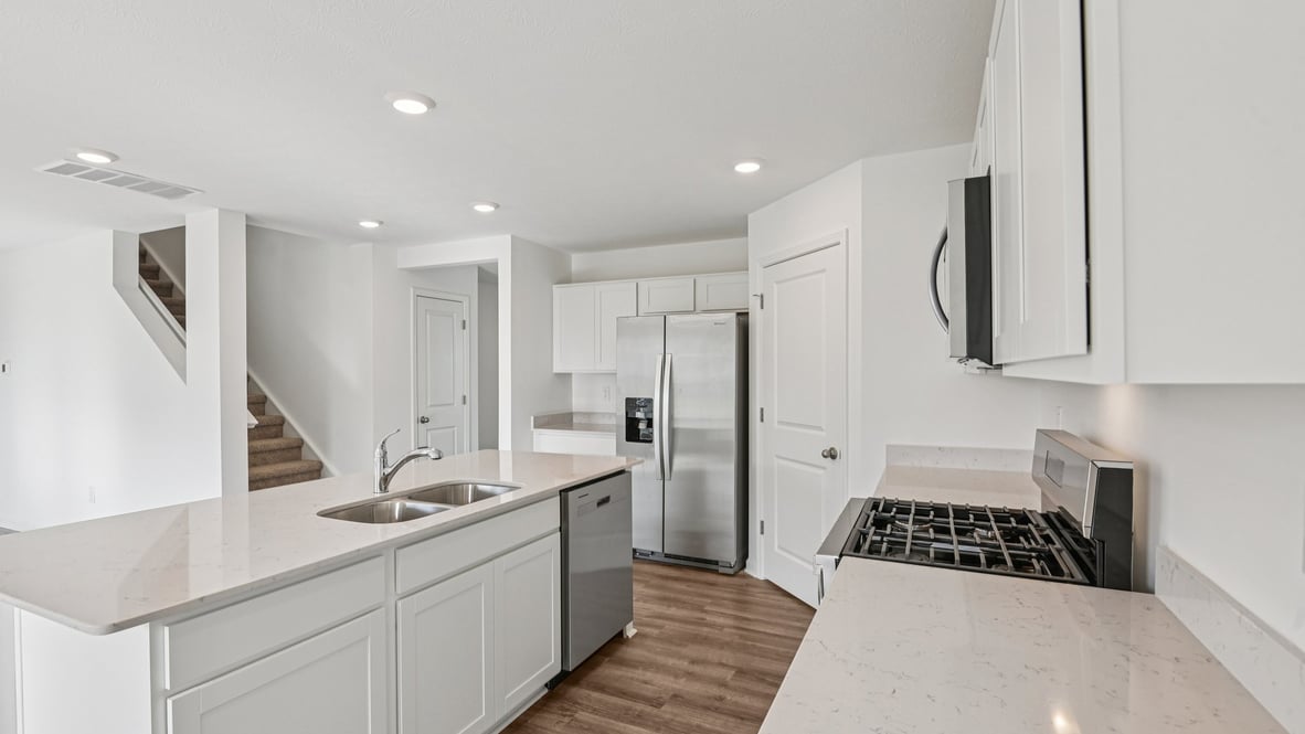 kitchen with large corner pantry