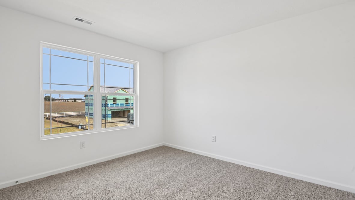 bedroom with large windows
