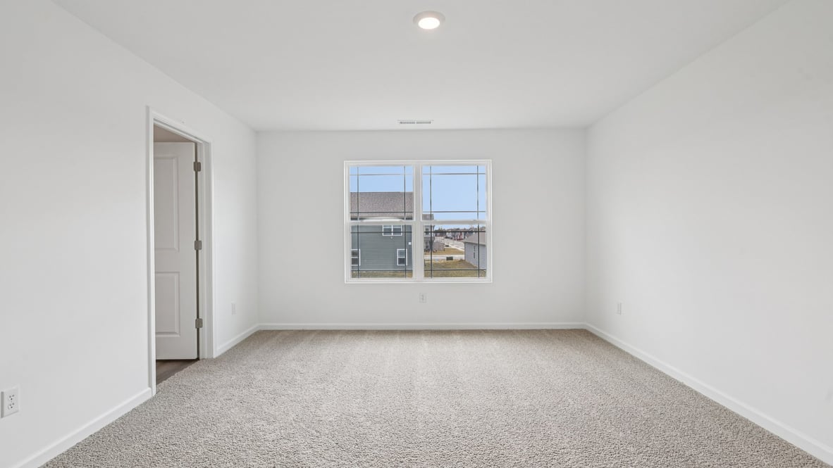 primary bedroom with large windows