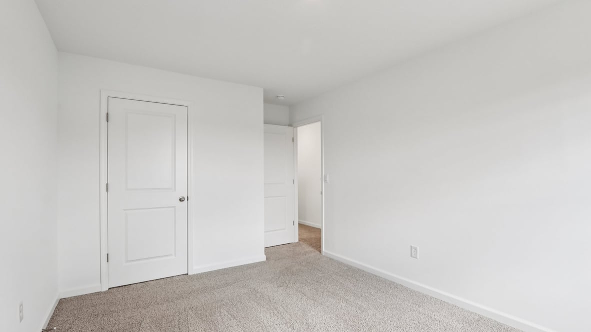 Secondary bedroom, flex-office, study, entertainment, game, craft room options in this D.R. Horton new construction home