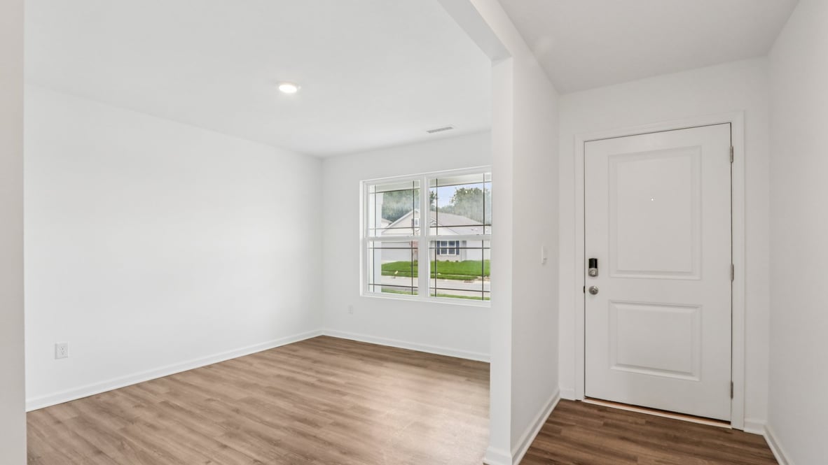 A foyer, entry hall inside front door, next to office, or sitting room adding a welcoming front, direct line of sight to home