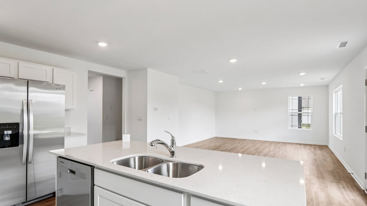 View from kitchen into the dining and living areas, backyard area, showing fresh open design at Centre Place
