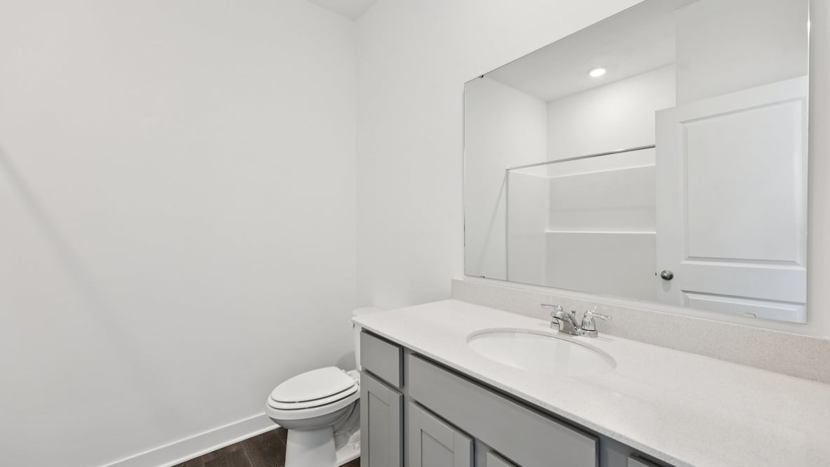 bathroom with shower and tub