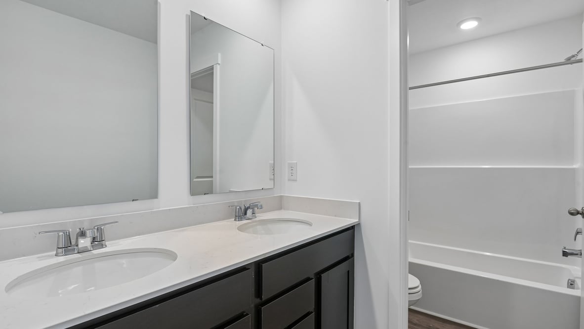 full bathroom upstairs with tub and shower