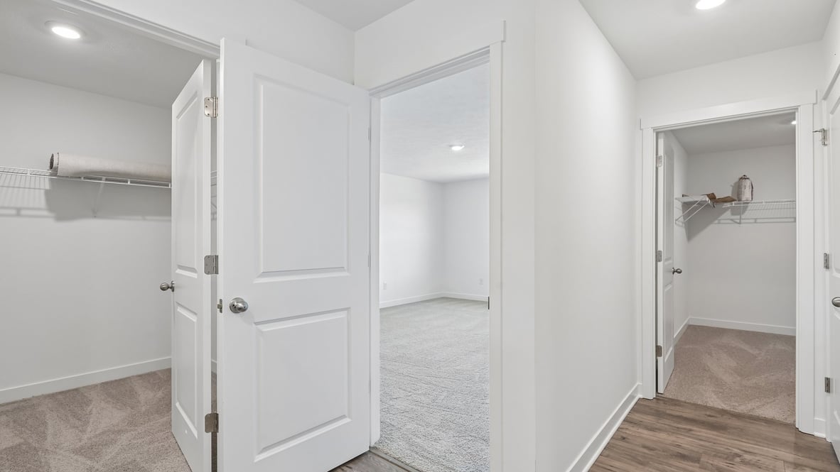 open concept living and dining area along with kitchen and sunroom